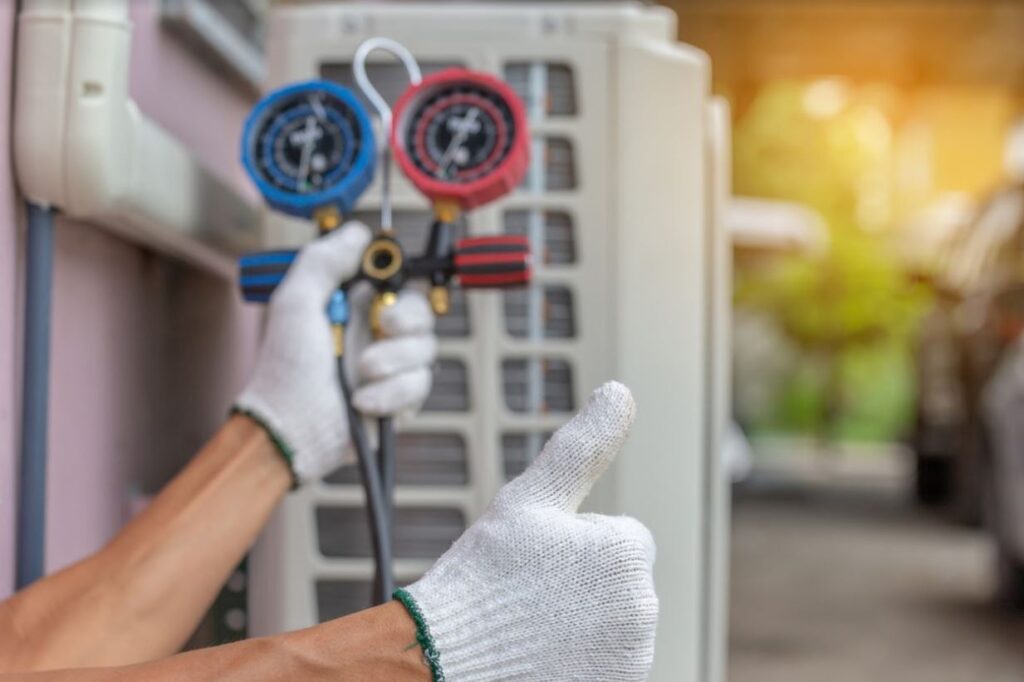 air conditioning technician servicing an outdoor unit in Charleston SC