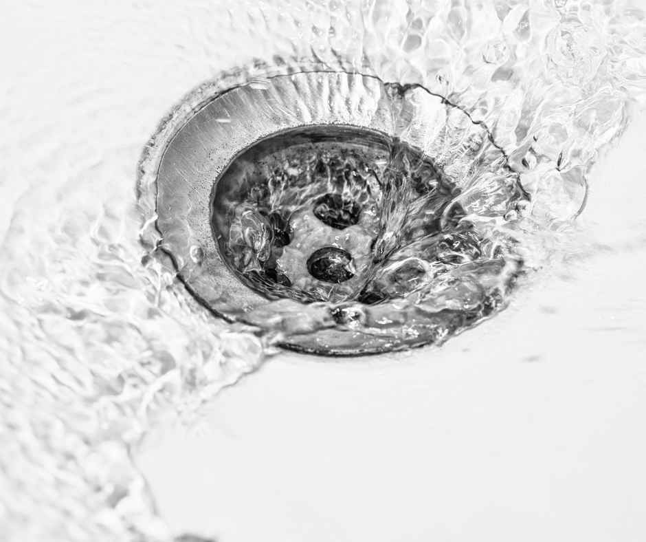 A drain with water flowing